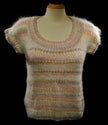 Woman's or girl's pastel colored sleeveless sweater vest with round neck in soft knit for spring and summer