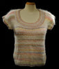 Woman's or girl's pastel colored sleeveless sweater vest with round neck in soft knit for spring and summer