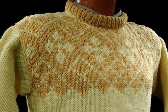 Child's yellow hand-knit wool-acrylic sweater with coffee-colored chest design and crew neck