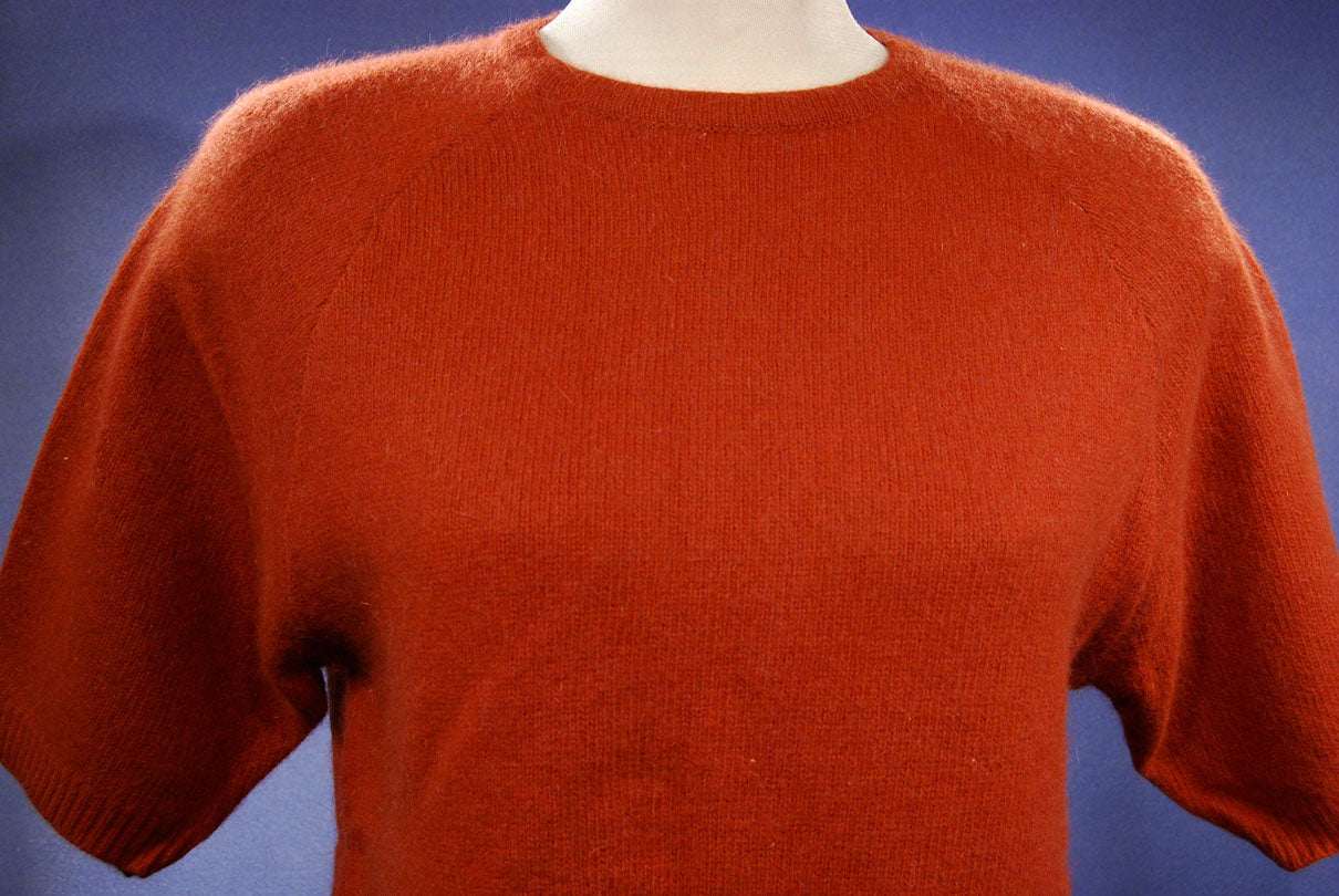 Woman's burnt-orange short-sleeved angora sweater with jewel neck by Claud Vernet, size 42