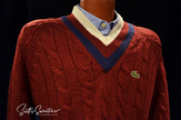 Men's classic retro burgundy Izod cable knit tennis sweater with blue and ivory striped neckband and Lacoste crocodile logo