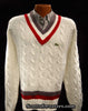 Men's classic retro Izod tennis sweater in white cable knit with grey and red V-neck and hem stripes and Lacoste crocodile logo