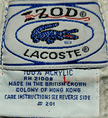 Original Izod Lacoste tennis sweater label with grey/red stripes and care instructions