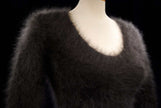Woman's sexy cropped 3/4-sleeve angora sweater in dark sable with cling-fit ribbed texture and V-neck design
