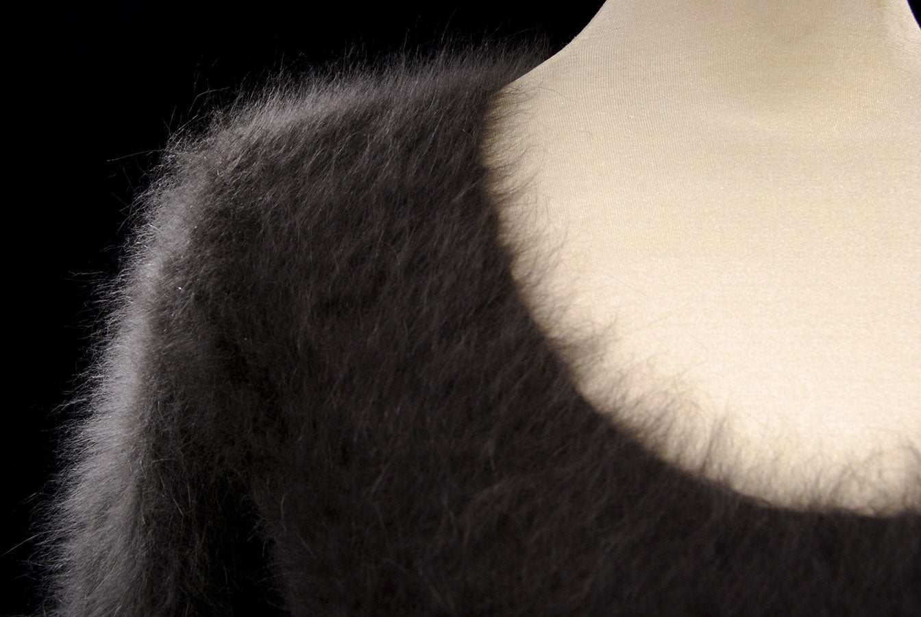 Woman's sexy cropped 3/4-sleeve fuzzy angora sweater in dark brown with ribbed cling-fit V-neck design