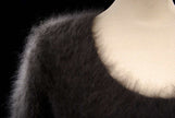Woman's sexy cropped 3/4-sleeve fuzzy angora sweater in dark brown with ribbed cling-fit V-neck design