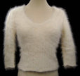 Woman's sexy cropped 3/4-sleeve angora ribbed V-neck sweater in soft beige