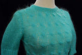 Girl's pale-green short-sleeve mohair crewneck sweater in bright aqua green on mannequin