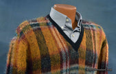 Vintage mohair sweater with retro shaggy plaid design and V-neck style on mannequin