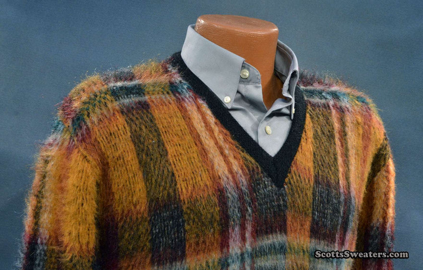 Vintage mohair sweater with retro shaggy plaid design and V-neck style on mannequin