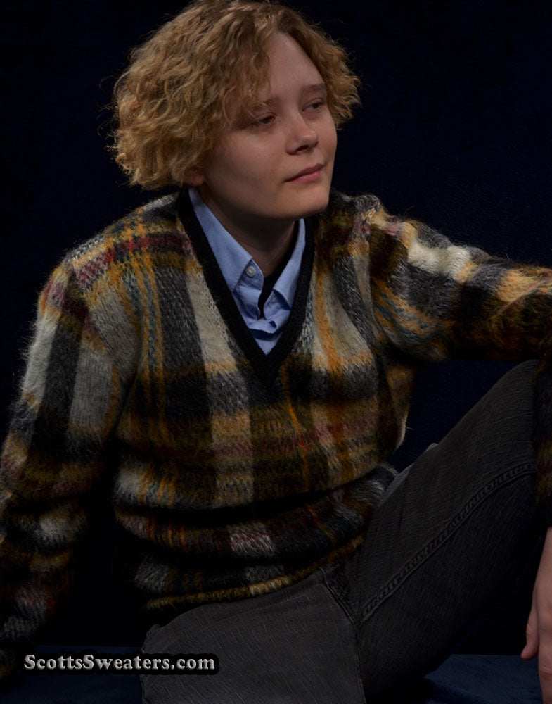 Vintage mohair sweater with retro shaggy plaid and V-neck design worn by a model