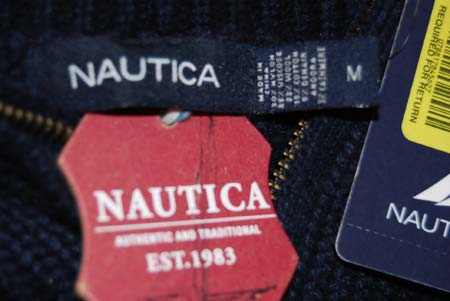Men's Nautica zip-neck pullover sweater in soft wool blend with white angora design