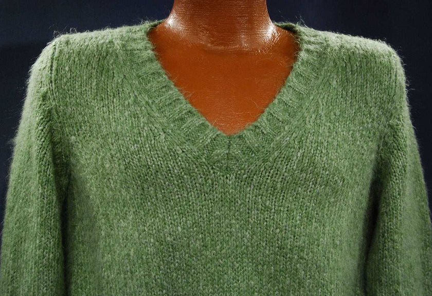 Woman's sage-green fuzzy V-neck pullover sweater in small-medium size by New York & Co.