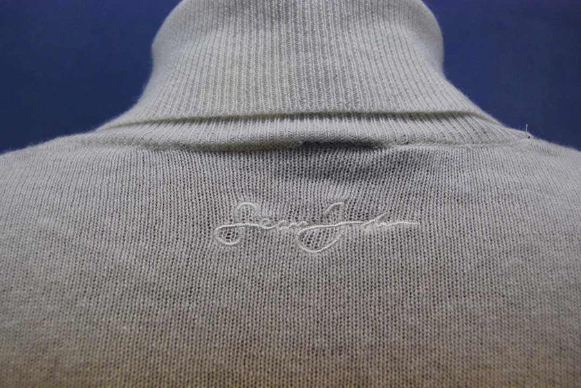 White cashmere turtleneck pullover sweater for men by Sean John in size X-Large