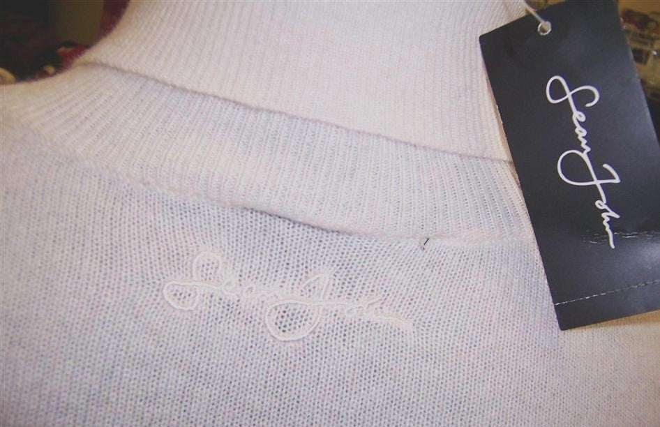 White men's cashmere turtleneck pullover sweater by Sean John in XL size