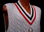 Men's white cable-knit sleeveless tennis sweater vest with red and navy V-neck trim by Polo Ralph Lauren