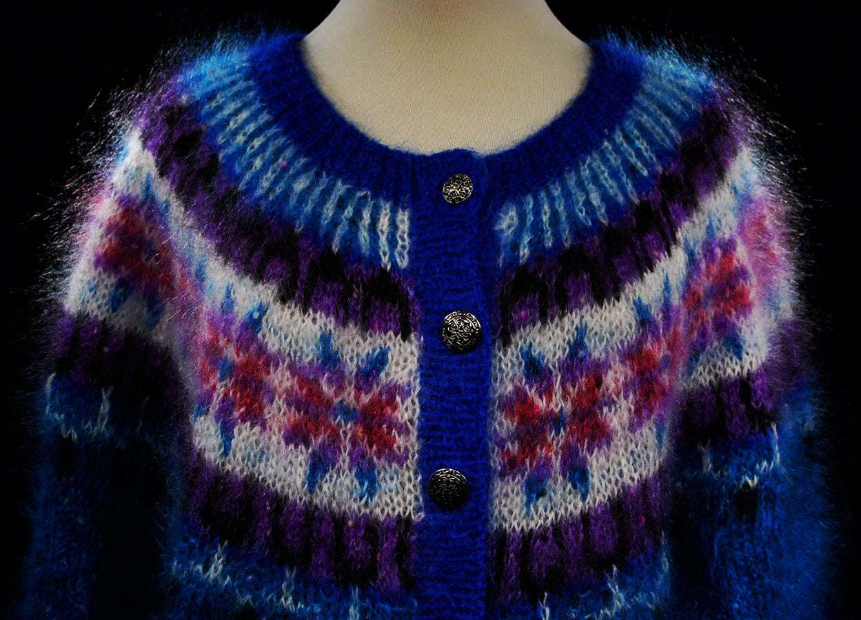Colorful woman's Icelandic design mohair cardigan sweater with metal buttons and vibrant pattern