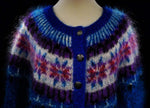 Colorful woman's Icelandic design mohair cardigan sweater with metal buttons and vibrant pattern