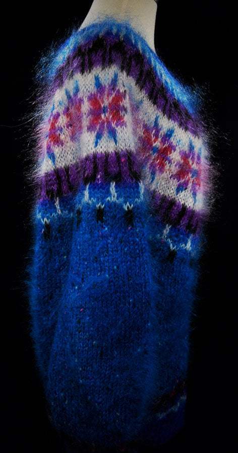 Colorful woman's mohair cardigan sweater with Icelandic design and floral pattern