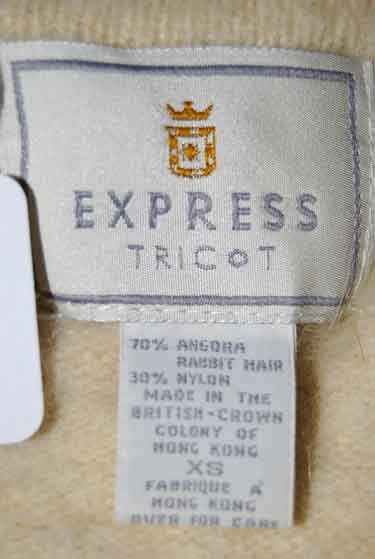 Woman's short-sleeve polo-neck angora sweater by Express with cling-fit design
