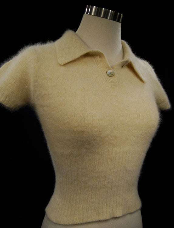 Woman's short-sleeve polo-neck angora sweater by Express with cling-fit design