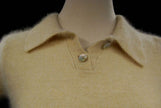Woman wearing a cling-fit short-sleeve polo-neck angora sweater by Express