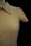 Woman wearing cling-fit short-sleeve polo-neck angora sweater by Express