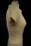 woman wearing a short-sleeve polo-neck angora sweater by Express