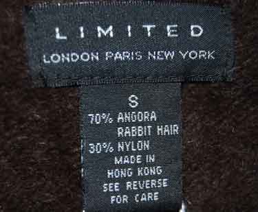 Woman's short-sleeve polo-neck angora sweater by Express cling-fit design
