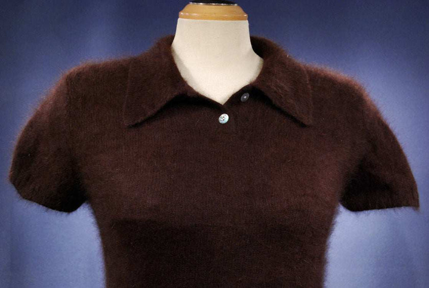 Woman wearing a cling-fit short-sleeve polo-neck angora sweater by Express