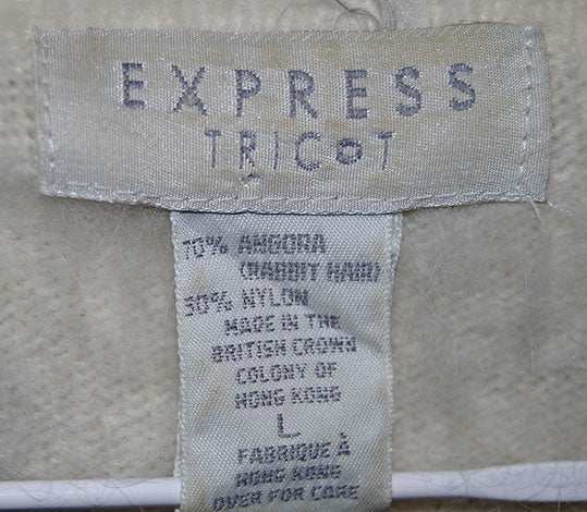 Woman's short-sleeve polo-neck angora sweater by Express with cling-fit design