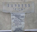 Woman's short-sleeve polo-neck angora sweater by Express with cling-fit design