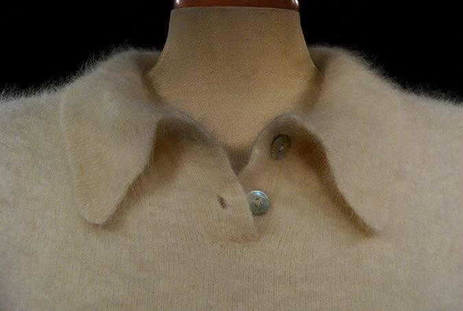 Woman's short-sleeve polo-neck angora sweater by Express, soft cling-fit design