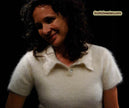Woman wearing a cling-fit short-sleeve polo-neck angora sweater by Express