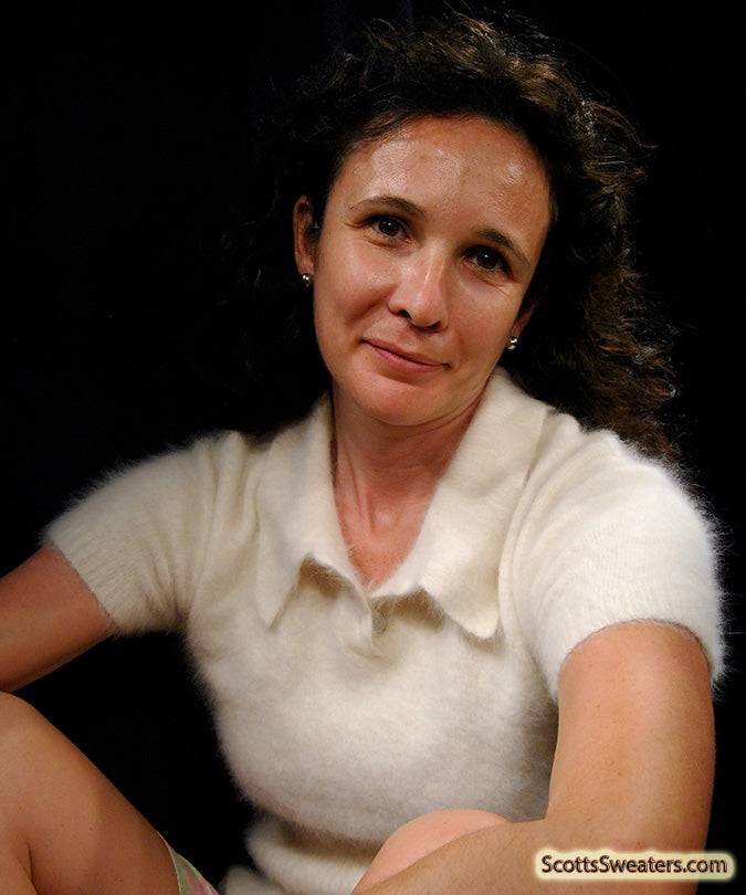 Woman wearing a cling-fit short-sleeve polo-neck angora sweater by Express