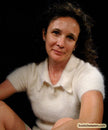 Woman wearing a cling-fit short-sleeve polo-neck angora sweater by Express