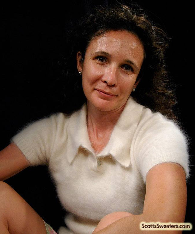 Woman wearing a cling-fit short-sleeve polo-neck angora sweater by Express