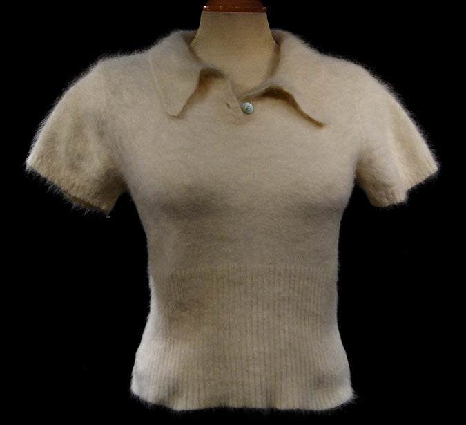 Woman's short-sleeve polo-neck angora sweater by Express in cling-fit design