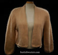 Woman's Angora Shrug cardigan sweater by Victoria Secrets, soft open-front cropped three-quarter sleeve design