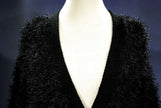 Black woman's eyelash cardigan sweater with long fuzzy acrylic fibers and four buttons, front pockets, X-Small/Small size