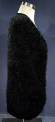 Black woman's eyelash cardigan sweater with long fuzzy faux rabbit fur fibers and front pockets on mannequin