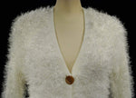 Women's white fuzzy eyelash cardigan sweater with four buttons and front pockets