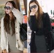 Woman's eyelash cardigan sweater in black and white with front pockets and long fuzzy acrylic fibers, modeled by woman wearing sunglasses.