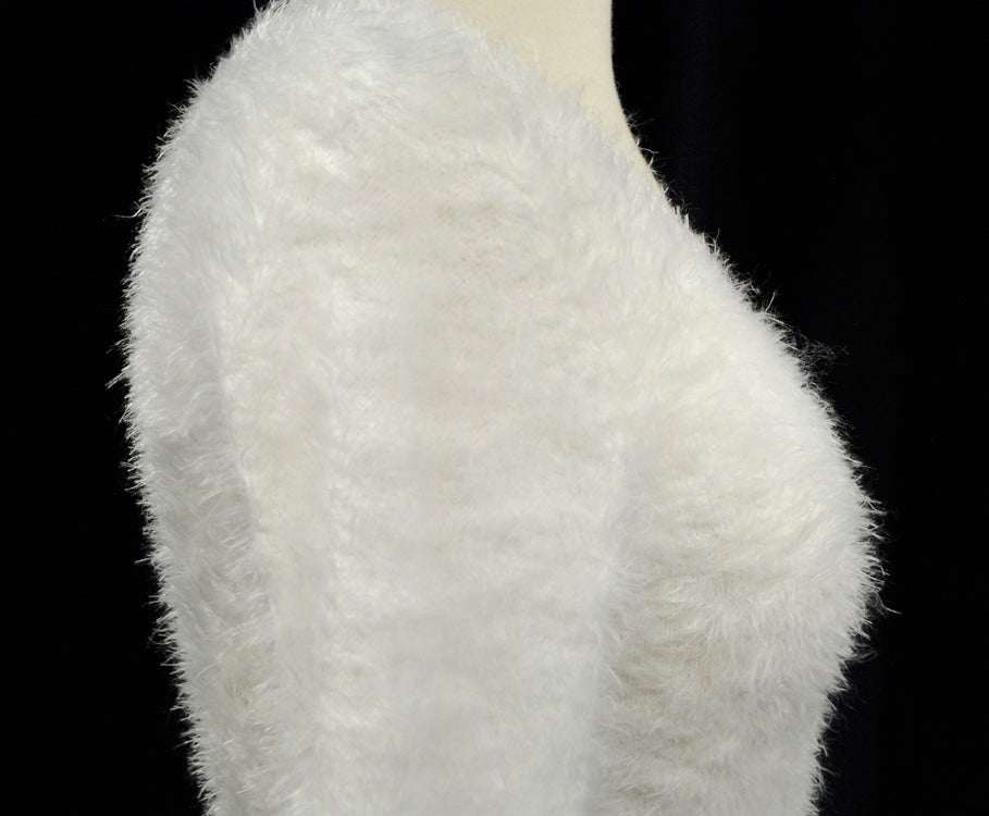 Woman's white ultra-soft fuzzy V-neck sweater with cling fit and extra-long design