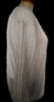 Woman's white angora rib-knit V-neck sweater by Christine Phillipe in small size displayed on mannequin side view