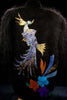 Woman's black angora cardigan sweater with colorful peacock design on back
