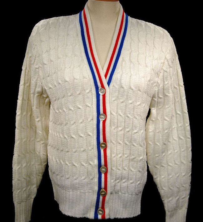 White cable-knit tennis sweater cardigan with red and blue trim stripes by Orlon Sayelle, women's retro style
