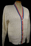 White cable-knit tennis sweater cardigan with red and blue trim by Orlon Sayelle