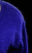 Woman wearing Victoria's Secret royal-blue angora scoop-neck sweater size Small-Medium