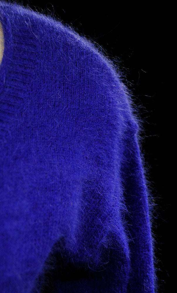 Woman wearing Victoria's Secret royal-blue angora scoop-neck sweater size Small-Medium